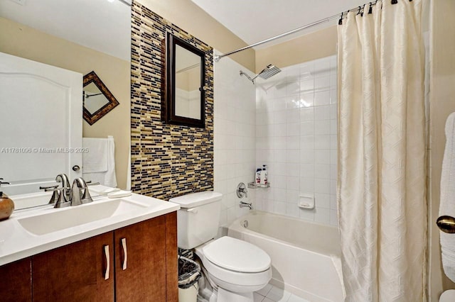 bathroom with shower / bath combination with curtain, tile walls, tile patterned flooring, vanity, and toilet