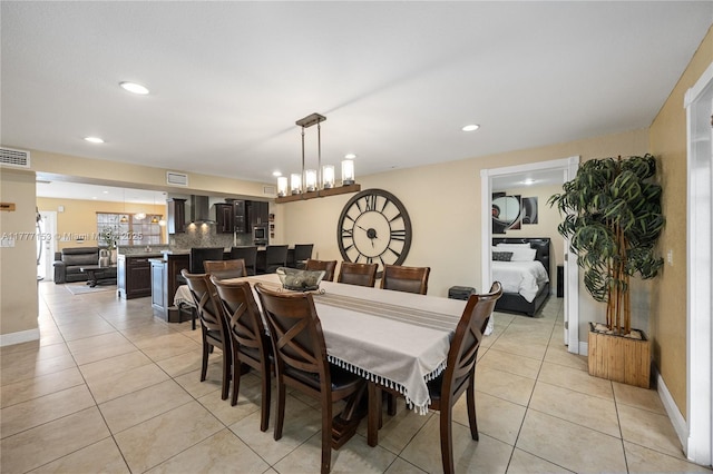 dining space with visible vents, baseboards, recessed lighting, and light tile patterned flooring
