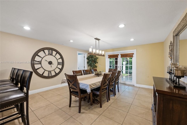 dining area with french doors, baseboards, recessed lighting, and light tile patterned flooring