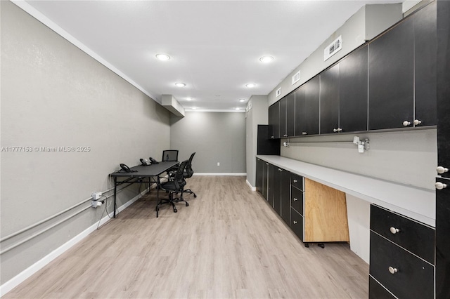 office area with light wood-style flooring, recessed lighting, and baseboards