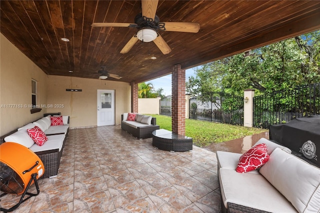 view of patio / terrace featuring an outdoor hangout area, ceiling fan, and fence