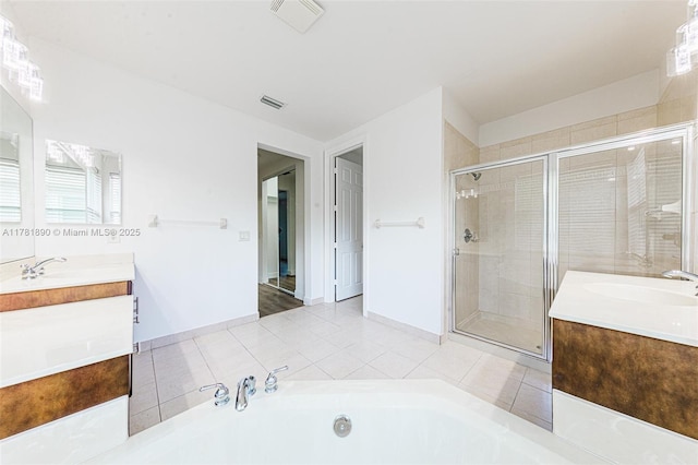 4981 SW 173rd Ave, Miramar, FL 33029 - full bath featuring vanity, a stall shower, a garden tub, and baseboards