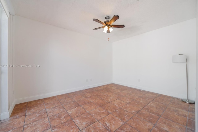 1551 Seagrape Way, Hollywood, FL 33019 - unfurnished room with baseboards and ceiling fan