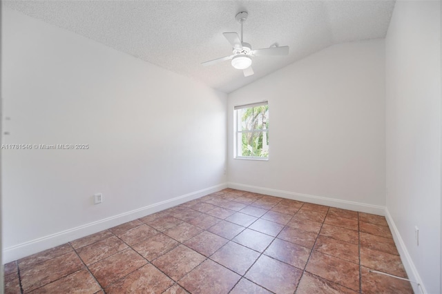 1551 Seagrape Way, Hollywood, FL 33019 - empty room featuring baseboards, a ceiling fan, a textured ceiling, and vaulted ceiling