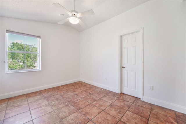 1551 Seagrape Way, Hollywood, FL 33019 - unfurnished room with baseboards, ceiling fan, and lofted ceiling