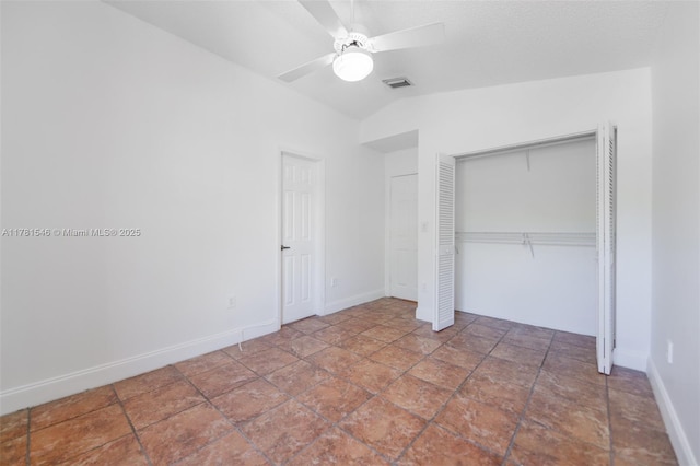 1551 Seagrape Way, Hollywood, FL 33019 - unfurnished bedroom featuring ceiling fan, baseboards, vaulted ceiling, visible vents, and a closet