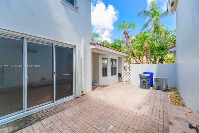 1551 Seagrape Way, Hollywood, FL 33019 - view of patio / terrace featuring central AC and fence