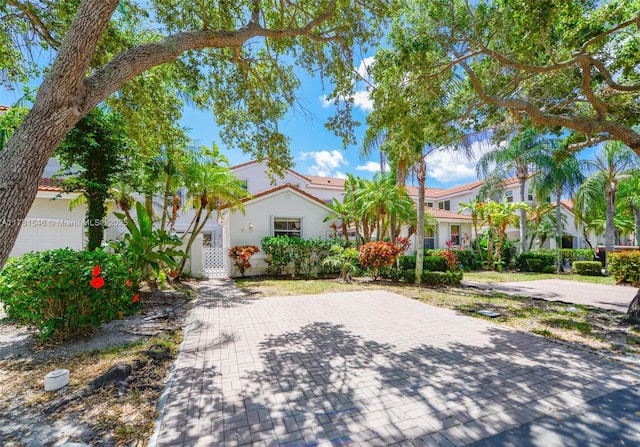 1551 Seagrape Way, Hollywood, FL 33019 - view of front facade featuring stucco siding