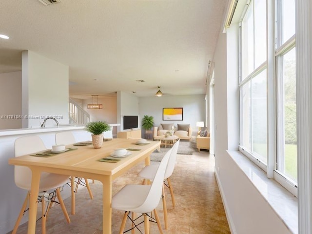 dining space with baseboards