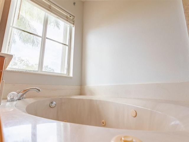 full bath with a jetted tub