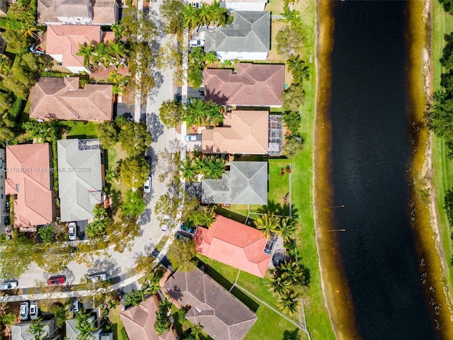 aerial view featuring a water view and a residential view