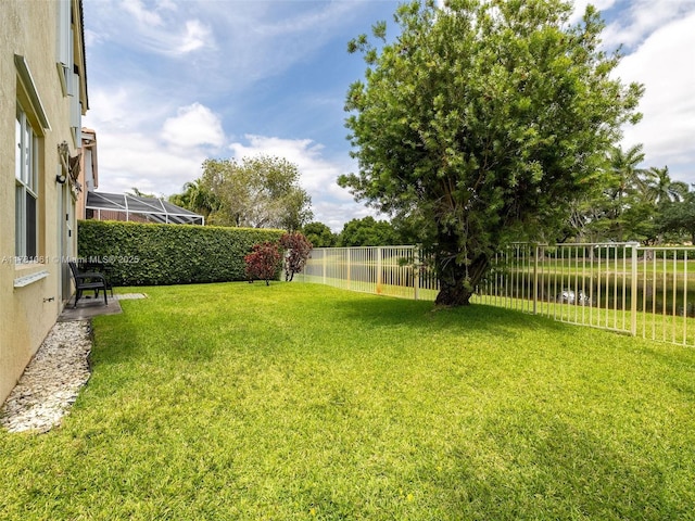 view of yard with a fenced backyard