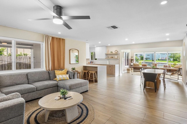 509 NE 29th St, Wilton Manors, FL 33334 - living area with a ceiling fan, recessed lighting, and light wood-style flooring