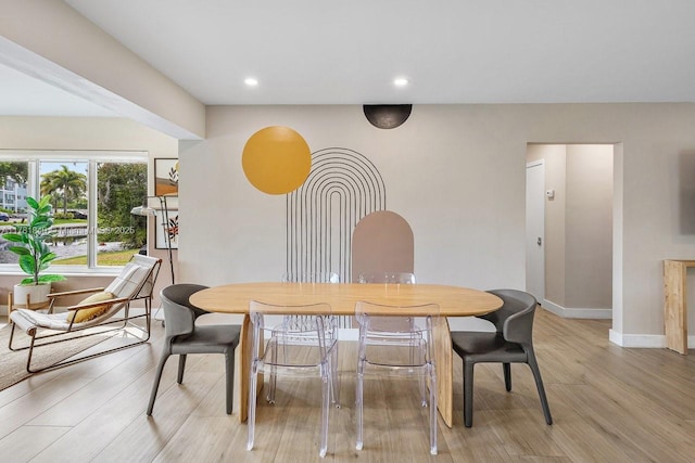 509 NE 29th St, Wilton Manors, FL 33334 - dining room with light wood-type flooring and recessed lighting