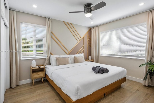 509 NE 29th St, Wilton Manors, FL 33334 - bedroom with light wood-style floors, recessed lighting, and a ceiling fan