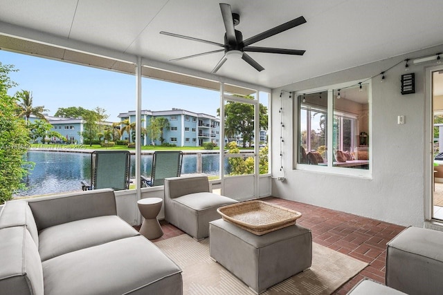 509 NE 29th St, Wilton Manors, FL 33334 - sunroom with ceiling fan and a water view