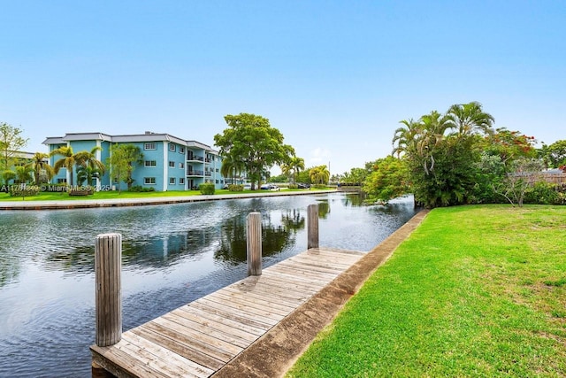 509 NE 29th St, Wilton Manors, FL 33334 - dock area featuring a water view and a yard