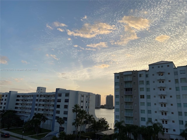 view of building exterior with a water view