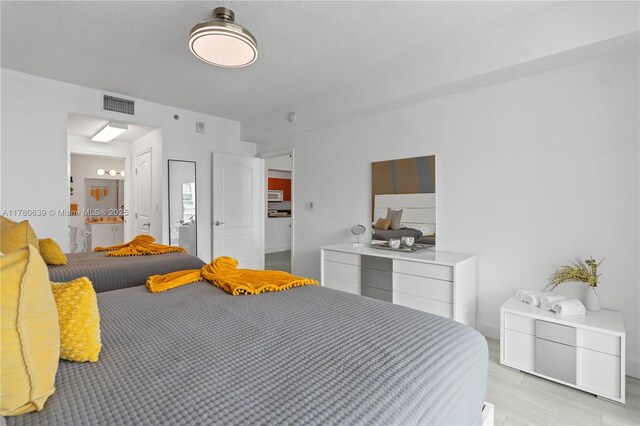 1200 Brickell Bay Dr Ph 4218, Miami, FL 33131 - bedroom featuring ensuite bath