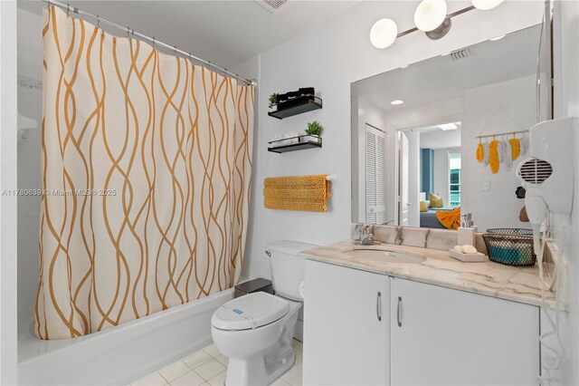 1200 Brickell Bay Dr Ph 4218, Miami, FL 33131 - full bathroom featuring vanity, toilet, tile patterned flooring, and shower / bath combo