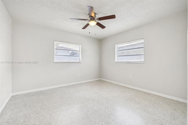 2650 SW 76th Ave, Miami, FL 33155 - empty room with speckle patterned floor, a textured ceiling, and a ceiling fan