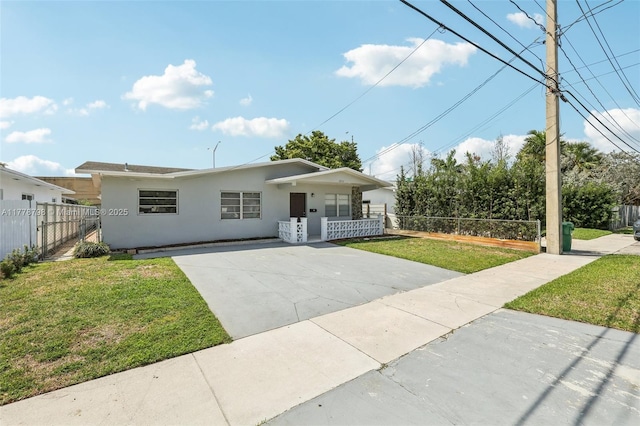 2650 SW 76th Ave, Miami, FL 33155 - view of front of home featuring driveway, stucco siding, and a porch