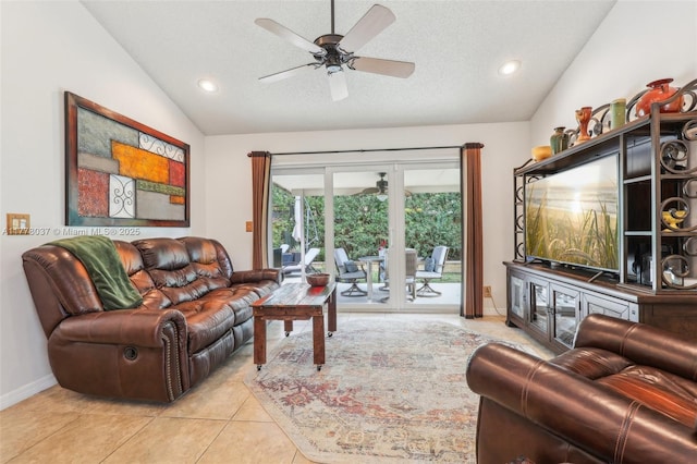 tiled living room featuring recessed lighting, lofted ceiling, a textured ceiling, and ceiling fan
