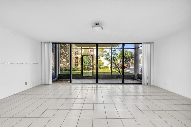 2821 SW 87th Ave Unit 808, Davie, FL 33328 - unfurnished room featuring light tile patterned floors and expansive windows