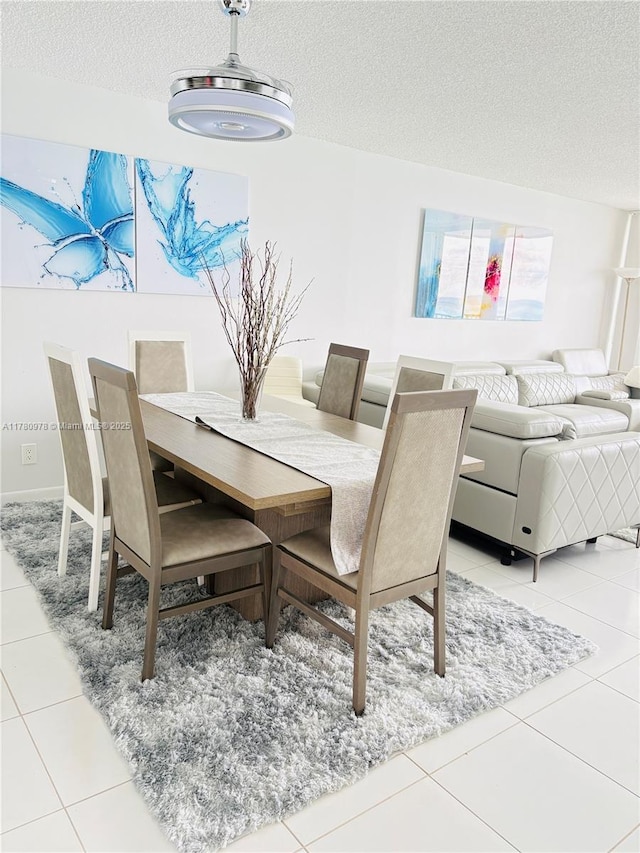 2101 S Ocean Dr Unit 1902, Hollywood, FL 33019 - dining area featuring a textured ceiling and light tile patterned floors