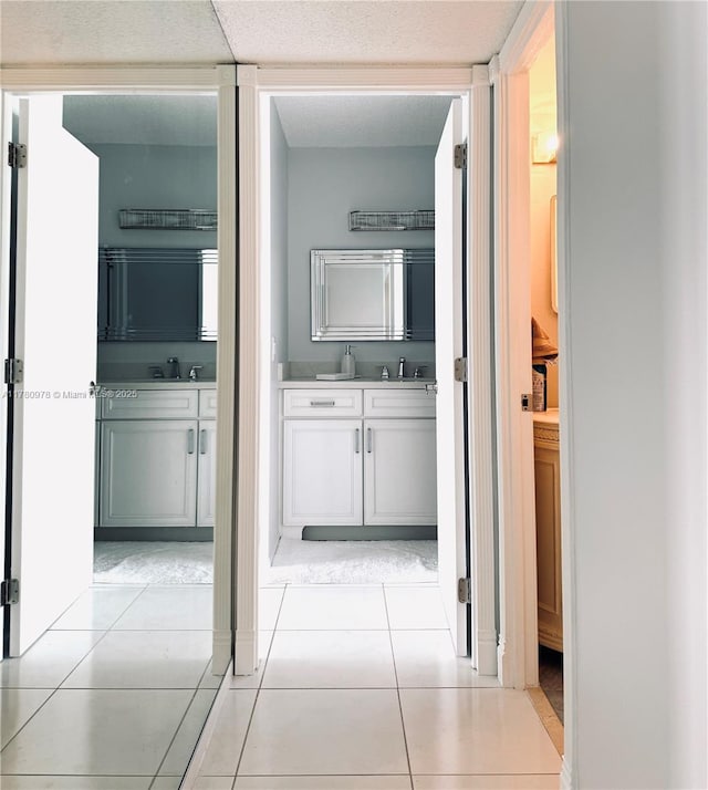 2101 S Ocean Dr Unit 1902, Hollywood, FL 33019 - hall with a sink and light tile patterned floors