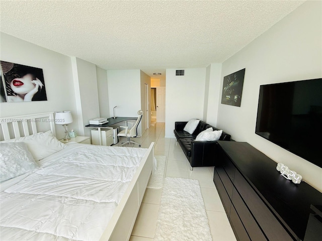 2101 S Ocean Dr Unit 1902, Hollywood, FL 33019 - bedroom with a textured ceiling, visible vents, and light tile patterned floors