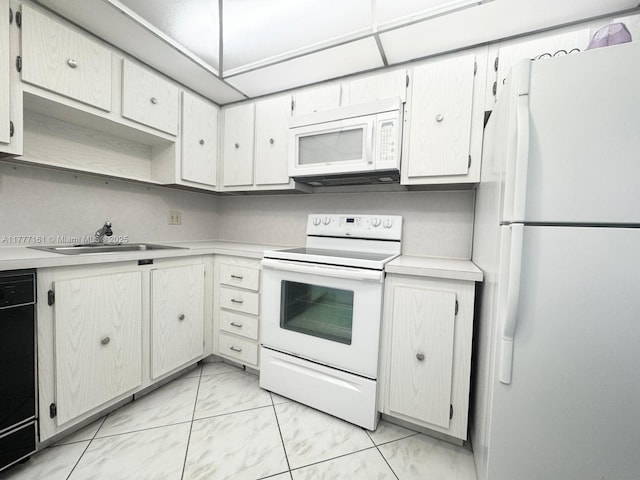 3800 S Ocean Dr Unit 1114, Hollywood, FL 33019 - kitchen with white appliances, light marble finish flooring, and light countertops