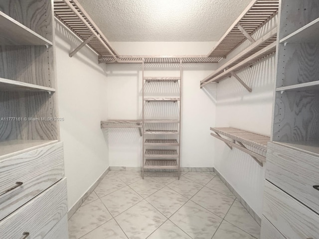 3800 S Ocean Dr Unit 1114, Hollywood, FL 33019 - walk in closet featuring light marble finish flooring