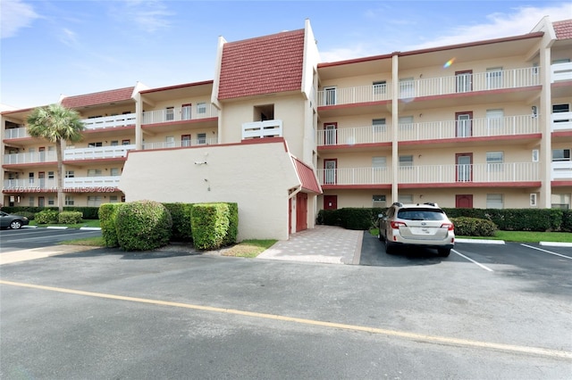 1020 Country Club Dr Unit 206, Margate, FL 33063 - view of property featuring uncovered parking