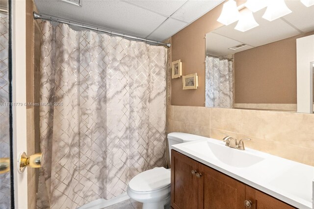 1020 Country Club Dr Unit 206, Margate, FL 33063 - full bath with vanity, curtained shower, toilet, visible vents, and tile walls