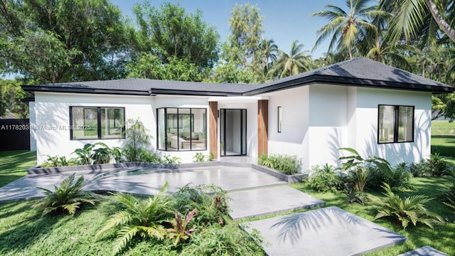 view of front of property featuring stucco siding