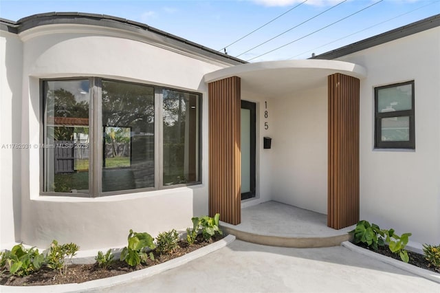 185 NE 106th St, Miami Shores, FL 33138 - property entrance featuring stucco siding