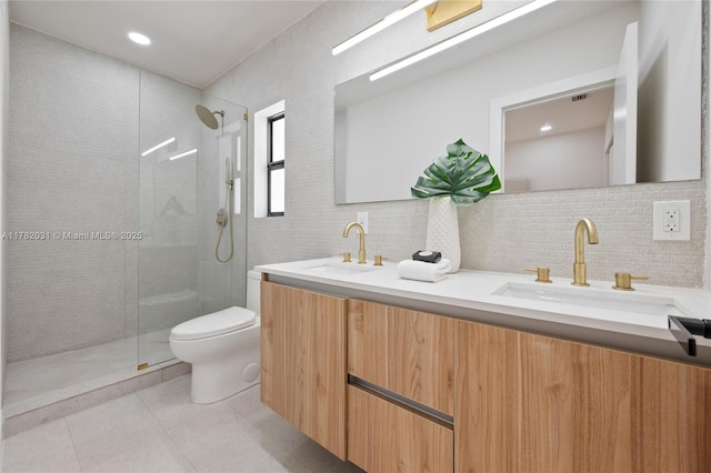 185 NE 106th St, Miami Shores, FL 33138 - full bathroom with double vanity, a walk in shower, tile patterned floors, tasteful backsplash, and recessed lighting