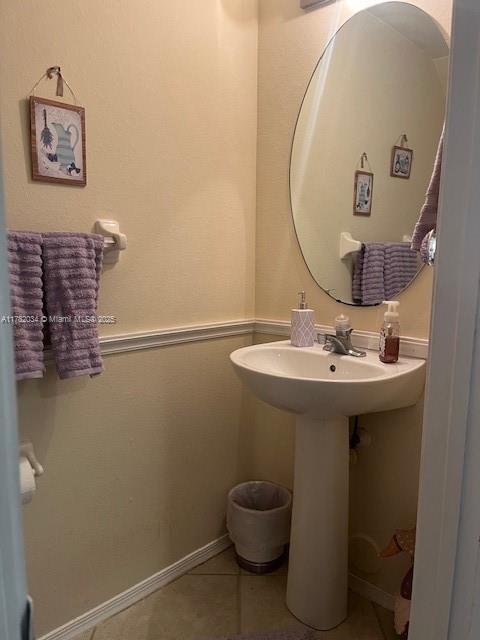 8066 Sanibel Dr Unit 8066, Tamarac, FL 33321 - bathroom with baseboards and tile patterned flooring