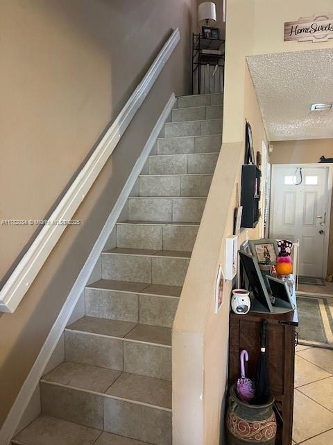 8066 Sanibel Dr Unit 8066, Tamarac, FL 33321 - stairway with tile patterned floors