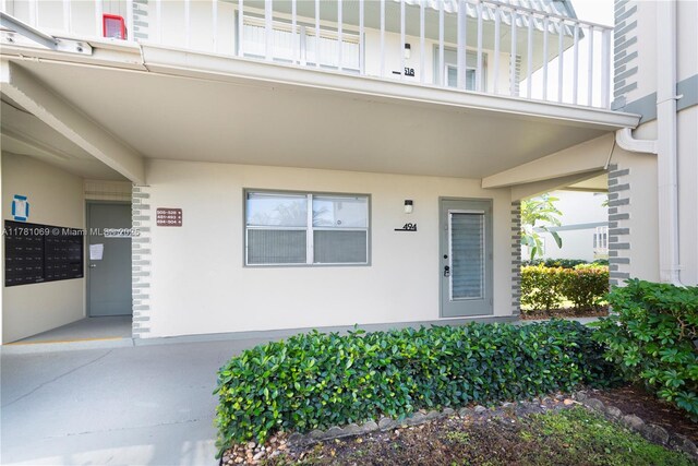 494 Monaco K Unit 494, Delray Beach, FL 33446 - property entrance featuring stucco siding