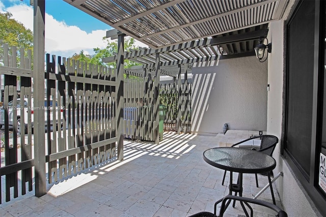 view of patio featuring a pergola