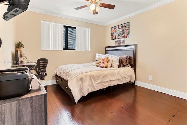 bedroom with dark wood-style floors, baseboards, ornamental molding, and a ceiling fan