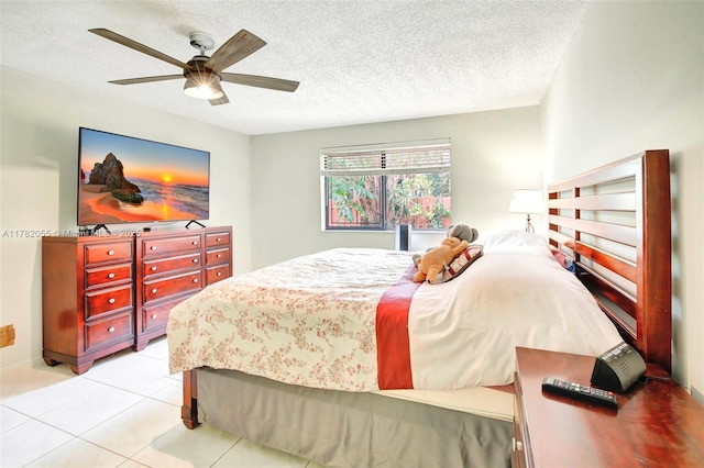 861 NW 79th Ter, Plantation, FL 33324 - bedroom featuring a ceiling fan, light tile patterned flooring, and a textured ceiling