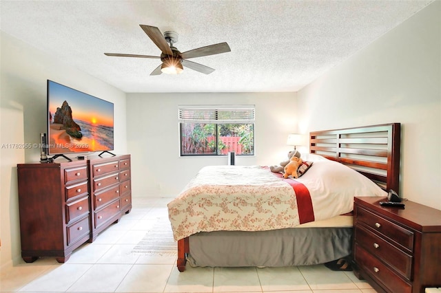 861 NW 79th Ter, Plantation, FL 33324 - bedroom with ceiling fan, light tile patterned flooring, and a textured ceiling