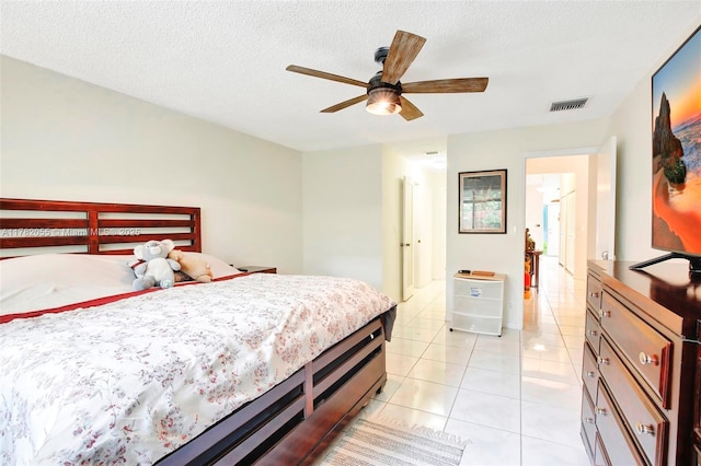 861 NW 79th Ter, Plantation, FL 33324 - bedroom featuring visible vents, a ceiling fan, light tile patterned floors, and a textured ceiling