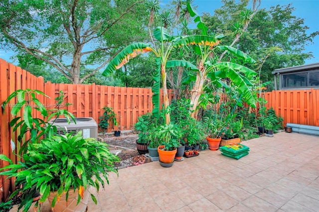 861 NW 79th Ter, Plantation, FL 33324 - view of patio / terrace featuring central AC and a fenced backyard