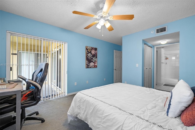 bedroom with visible vents, a textured ceiling, a closet, and access to exterior