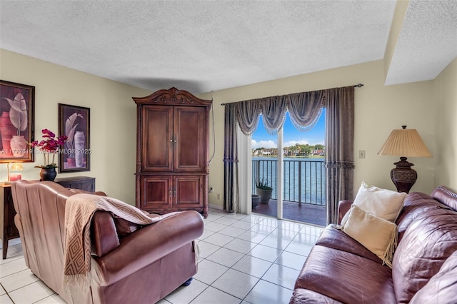 300 NW 107th Ave Unit 201, Miami, FL 33172 - living room with a textured ceiling and light tile patterned floors
