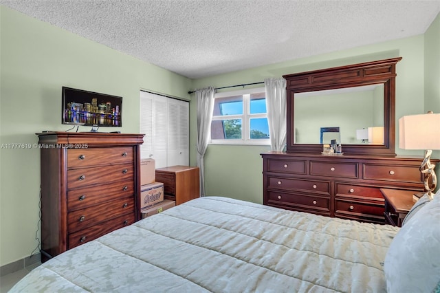 300 NW 107th Ave Unit 201, Miami, FL 33172 - bedroom with a closet and a textured ceiling